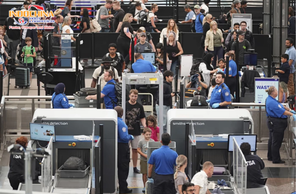 Passengers lining up at the security checkpoint at Denver International Airport
